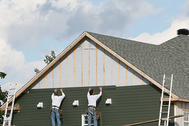 Professional Siding Installation technician working in Kittrell, NC